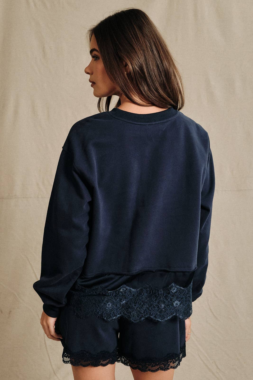Round Neck Lace Trimmed Hem Long Sleeve Sweatshirt