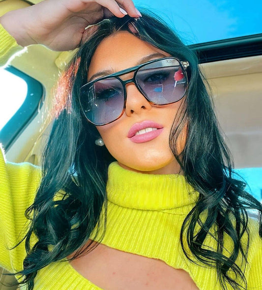 “Skye sunglasses by Dax Eyewear – boutique sunglasses with brown lenses”

“Close-up of trendy boutique sunglasses – gold frame Skye eyewear”

“Women’s boutique sunglasses – Skye style by Dax Eyewear”