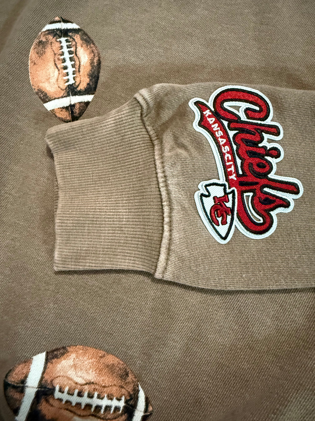 KC Chiefs Sleeve Patch Brown Football Mock Neck | Queen Bee