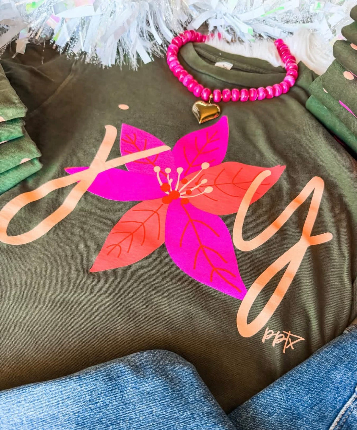 Joy Poinsettia Holiday Graphic Tee – Olive Green with Pink & Coral